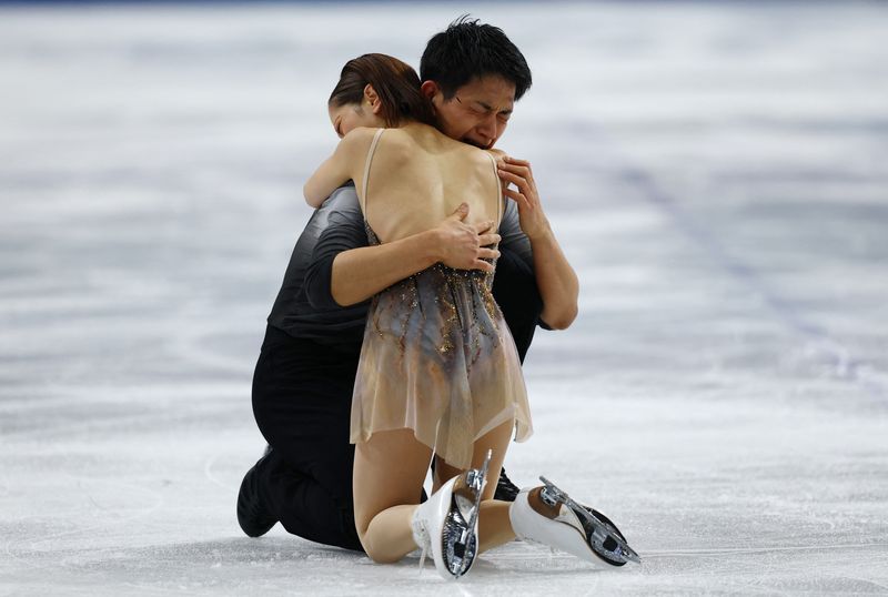 Olympics-Figure skating-Japan's Miura and Kihara say pairs gold 'hasn't hit' after comeback win