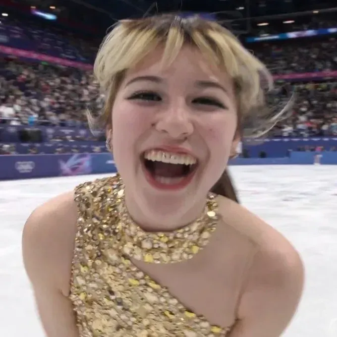 https://designalls.com/wp-content/uploads/2026/02/alysa-liu-delivered-an-unforgettable-moment-at-the-milano-cortina-winter-olympics-skating-directly-towards-the-camera-after-sec.webp