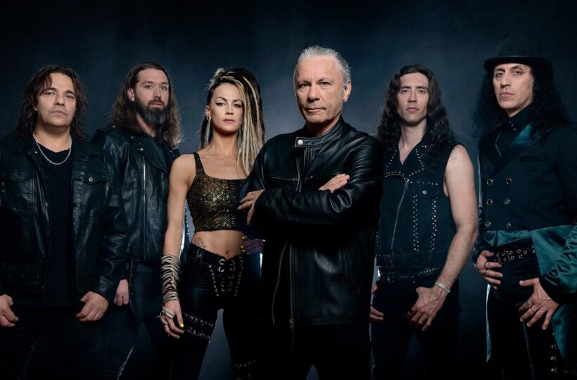 Bruce Dickinson at the centre of his six-member solo band in a promotional portrait