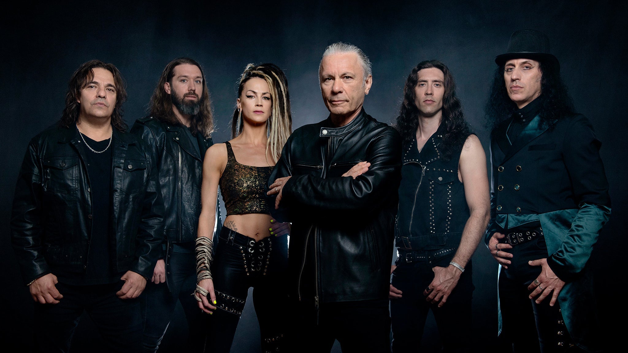 Bruce Dickinson at the centre of his six-member solo band in a promotional portrait