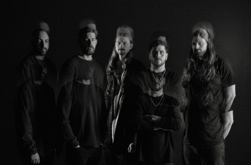 Black-and-white promotional portrait of the five members of Currents with overlapping exposures
