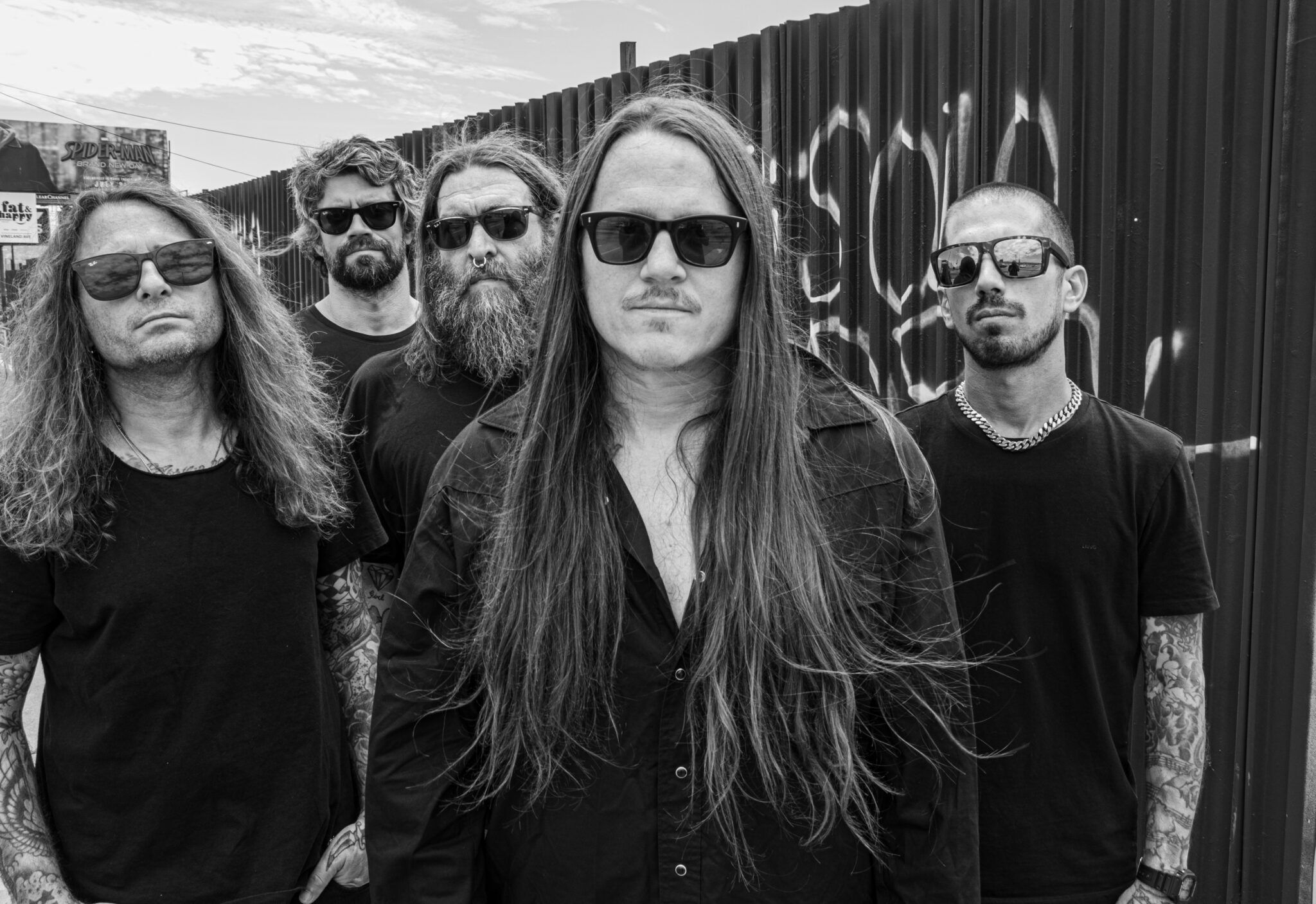 The five members of Darkest Hour in their Suffer Divine promotional photograph by Pep Williams