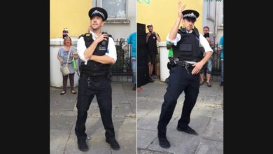 A Dancing Police Officer Becomes Part of the Notting Hill Carnival Crowd