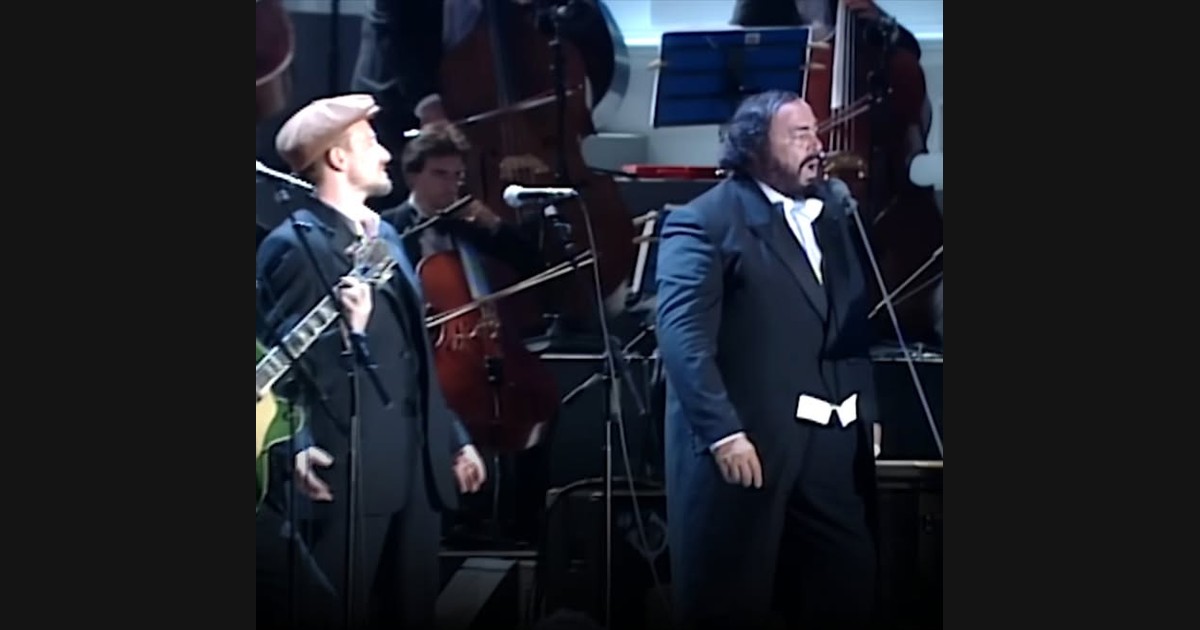 Bono and Luciano Pavarotti Meet in “Miss Sarajevo”
