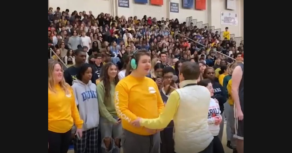 A Student Ensemble Shares the Anthem Before a Basketball Game