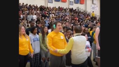 Students Share the National Anthem in a School Gymnasium