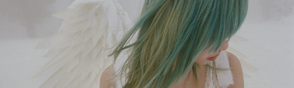 Wisp in the official Interscope artist promotional image